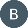 White letter B on dark grey circular background
